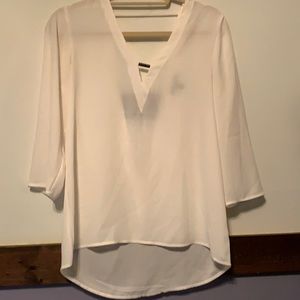 Light weight blouse with statement back